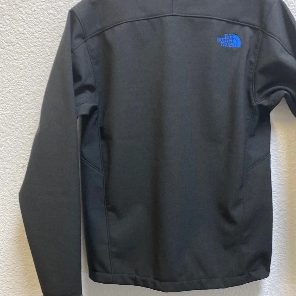 The North Face Men's Black Jacket with Blue Accents